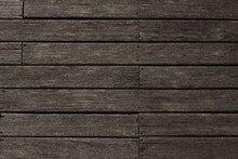 Wooden Planks Cut And Fastened With Rusty Nails And Screws. Brown Wood Backgroud Texture Background