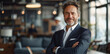© ArtCraft - Confident Business Leader at Modern Office. Smiling mature male professional with crossed arms in a contemporary office setting.