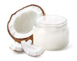 Glass jar of coconut oil and fresh coconut halve and pieces on white background