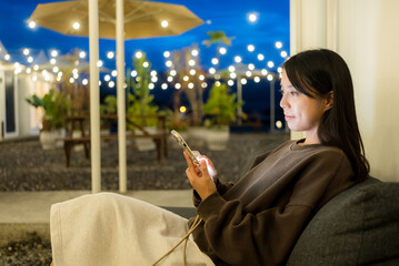 Poster - Woman use of mobile phone in hotel