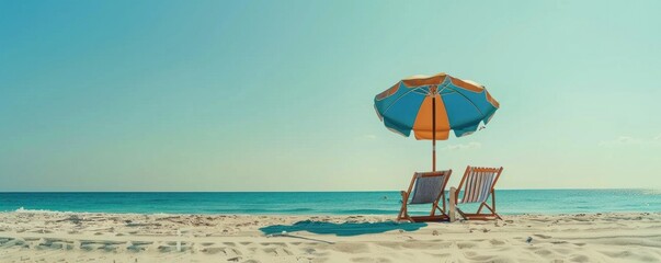 Poster - The view of chairs and umbrellas on the beach is beautiful in summer