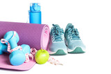 Fototapeta Mapy - Yoga mat, sneakers, dumbbells and bottle of water isolated on white background.