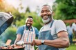 African men grilling with his father in the garden of the house talking and laughing