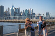 Family Day Out: Enjoying the Manhattan Skyline from Brooklyn