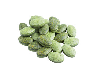 Green medical pills, drugs or tablets for treatment isolated on transparent background, vitamins and minerals, nutritional or dietary supplement