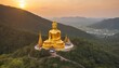 evening, golden buddha statue in Khao Noi temple, Nan Province, Thailand