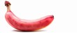   A red banana with a slice of fruit protruding from its side, set against a pure white background