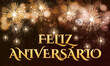© emmanuel - cartão ou banner para desejar feliz aniversário em ouro sobre fundo marrom e preto com fogos de artifício dourados