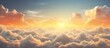 The suns rays are breaking through the clouds in the sky, creating a beautiful orange afterglow in the atmosphere during dusk
