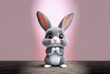 Cute and fluffy gray bunny with big eyes and a pink nose. It is standing on its hind legs and has its paws together in front of its chest.