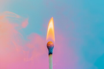 A matchstick is lit and the flame is yellow