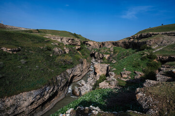 Wall Mural - Panoramic view of the Aksu River canyon in Kazakhstan in spring