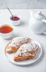 Wall Mural - Almond croissants with sugar sprinkles in a plate