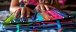 Back to School Excitement: Close-Up of Student Hands Organizing Planner with Colorful Pens, Stickers, and Tabs for New School Year Preparation