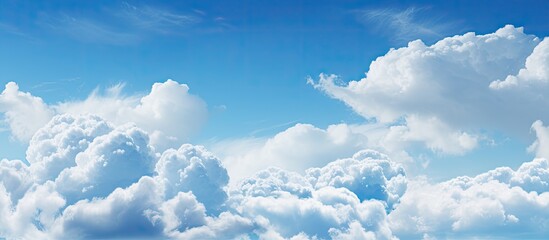 Wall Mural - Scattered clouds in the sky are mirrored in tranquil water creating a serene and peaceful scene