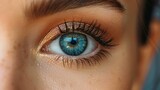 Fototapeta  - close up of a female eye with long eyelashes