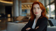 Confident, Irish woman, sophisticated and elegant managing director of global company. Red hair, theme women at top. Space for text.