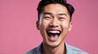 young asian man on plain bright pink background laughing hysterically looking at camera background banner template ad marketing concept from Generative AI