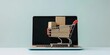 Concept of online shopping featuring a laptop computer atop a cart filled with boxes