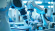 © phairot - Industrial Robotic Arms Assembling Products. Advanced robotic arms engaged in precision assembly of products on a modern, high-tech industrial manufacturing line.