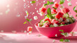 Captured in mid-air, the elements of a watermelon salad add dynamic to the bright setup