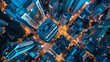 City Pulse: Aerial Night View. An aerial view of a city at night, showcasing the vibrant pulse of urban life with streets lit by the glow of traffic and building lights.