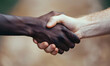 close up hands of African man and white man hand shaking, Generative AI