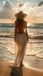 Beautiful shapely woman on the beach. Holiday time