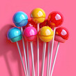 Grupo de chupachus multicolor, de chicle, sobre fondo rosado, bastoncillos. blancos, pompa de caramelo rojo, amarillo, azul rosa, brillante, ilustración 3D, fiesta diversión, chuchería niñez, infancia