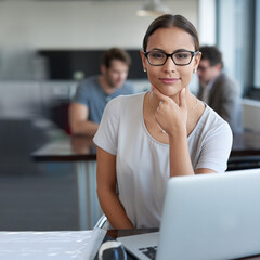 Leinwandbilder - Portrait, thinking and business woman on laptop at table in office for creative career or job in startup. Face, computer and professional entrepreneur planning, employee and copywriter with glasses