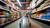 Fototapeta  - Shopping in supermarket by supermarket cart in motion blur.
