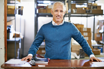 Aufkleber - Man, portrait and logistics in warehouse with smile for manufacturing at counter for supply chain, shipping and management. Male person, factory and boss for commercial distribution of cargo in plant