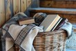 wicker basket with a blanket and books for a cozy reading gift