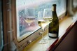 wine bottle with two glasses on ship window sill
