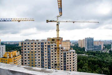 Wall Mural - construction site with cranes