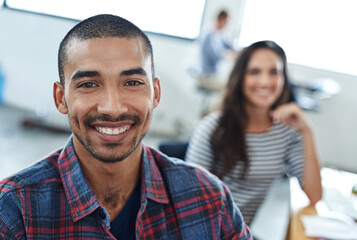 Poster - Happy, office and portrait of man coworking with team on creative project in Brazil company. Excited, employee and person with a smile for productivity on collaboration in workplace with teamwork