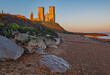 Reculver Towers Kent from the beach on a red dawn morning