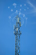 a tower with antennas that broadcasts a signal against a blue sky with clouds, wireless telecommunication technology, Global connection and internet network concept.