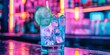 A close-up view of a gin drink sitting on a bar with neon lights in the background
