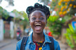 Photo of excited African young adult girl against a blurred street background. Successful and celebrating victory, concept of winner, freedom, happiness