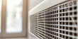 Modern Wall Ventilation Grille. Close-up of a wall-mounted air vent.