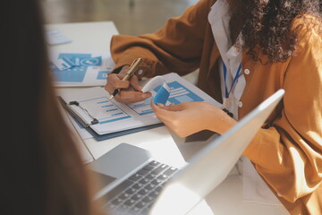 Close up ux developer and ui designer use augmented reality brainstorming about mobile app interface wireframe design on desk at modern office.Creative digital development agency