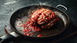 conceptual image of a brain sizzling in a frying pan, symbolizing brainstorming or mental stress.