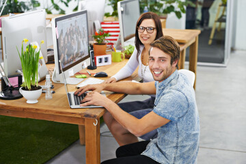 Sticker - Collaboration, man and woman with laptop, portrait and monitor on desk, technology and internet. Employees, staff and colleagues with smile for project, happiness and teamwork for creative design