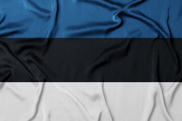 Digital render of an Estonian flag on a wrinkled fabric material