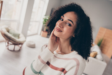 Sticker - Photo of cute positive lady dressed striped pullover smiling arm cheek indoors apartment room