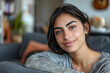 © JuanM - Portrait of a diverse woman with a captivating look in a residential setting