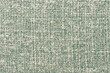 Macro closeup of green and blue tweet fabric texture