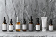 Elegant skincare bottles arranged in a row on a chic, textured surface, showcasing their uniformity and design,
