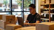 © ramona - Owners man entrepreneurs working, box and check online orders or selling with computer to prepare pack the boxes to customer, SME business online concept.